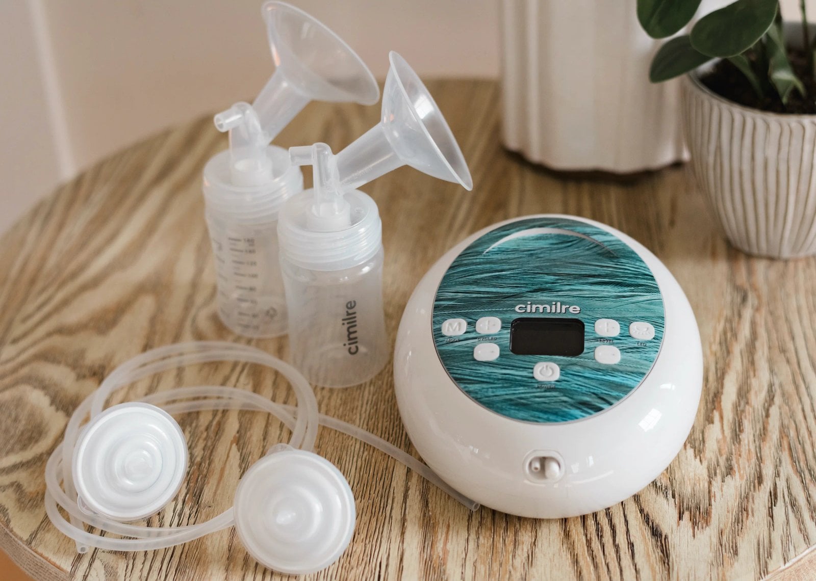 Cimilre S6 breast pump shown with its collection kit