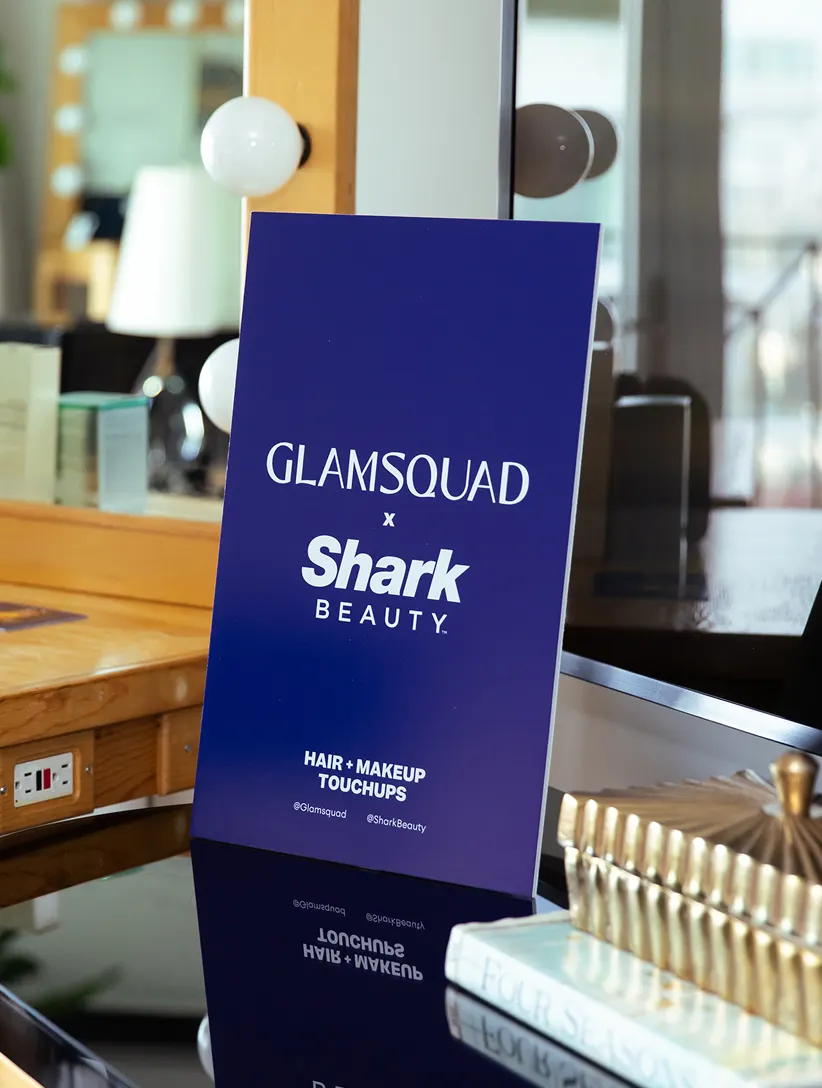 Glamsquad stylist creating a sleek blowout at home