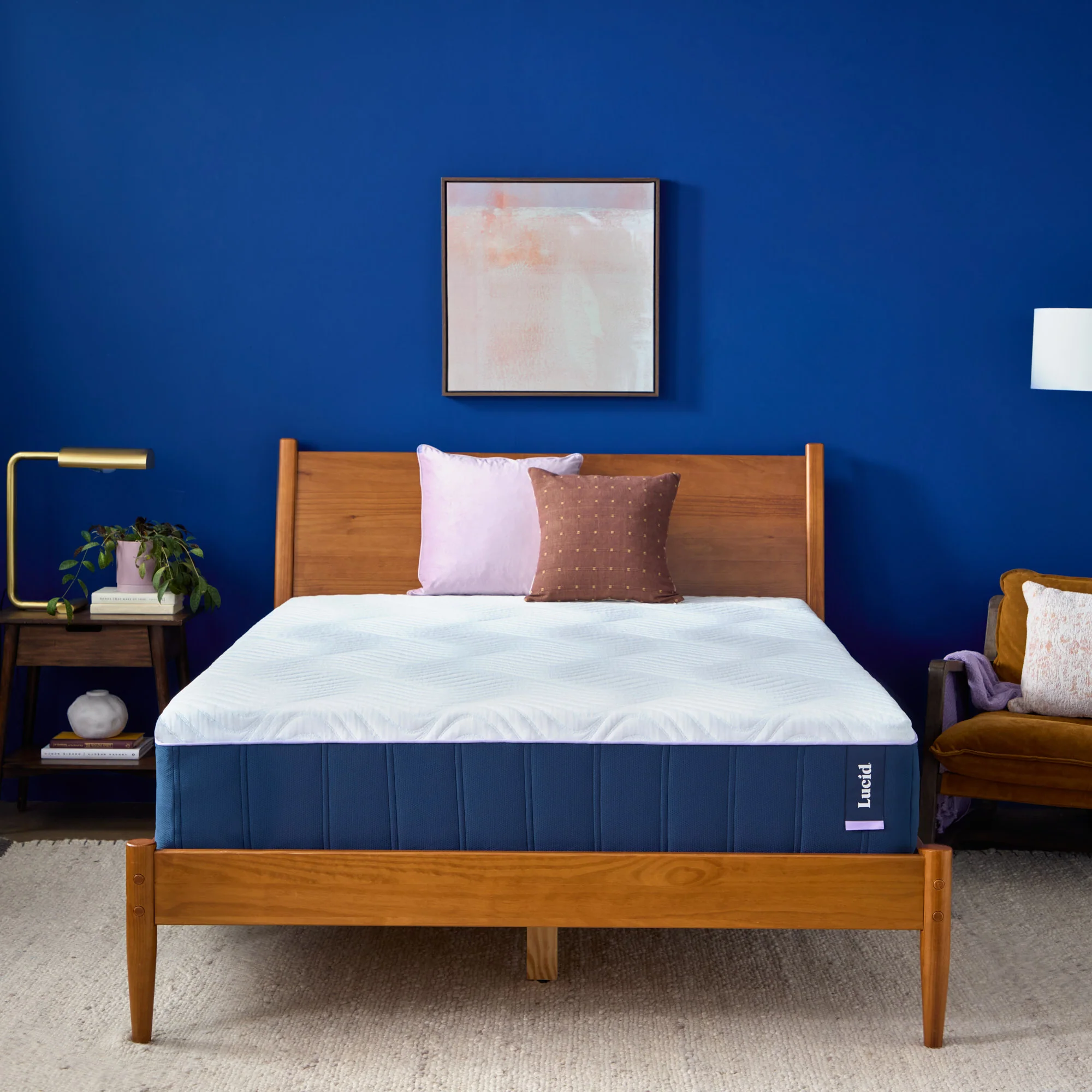 Lucid Blue Cooling Hybrid Mattress shown on a bed frame