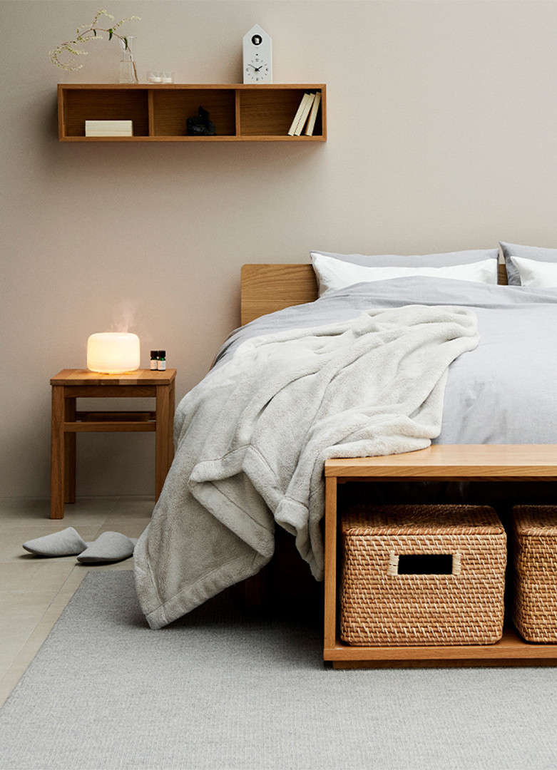 Soft furnishings arranged in a warm home interior