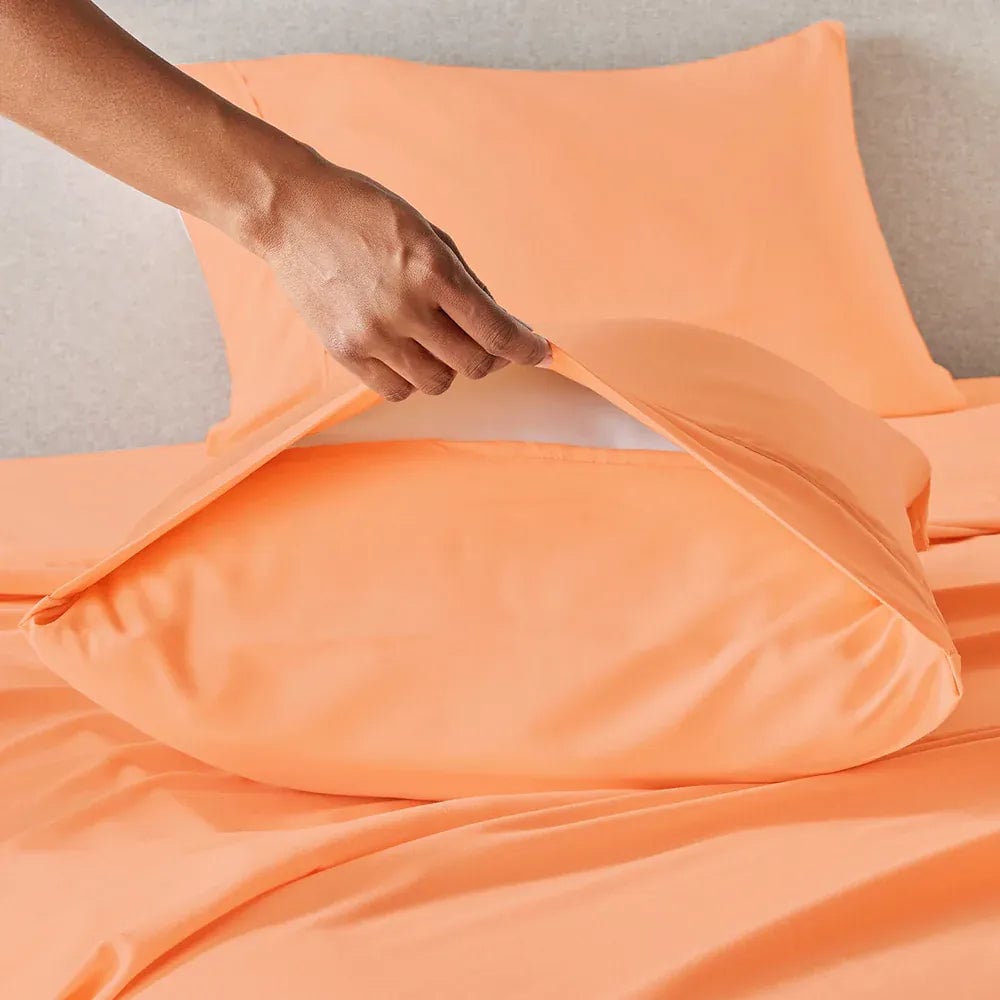 Brushed Silver PeachSkinSheets sheet set folded on a white background
