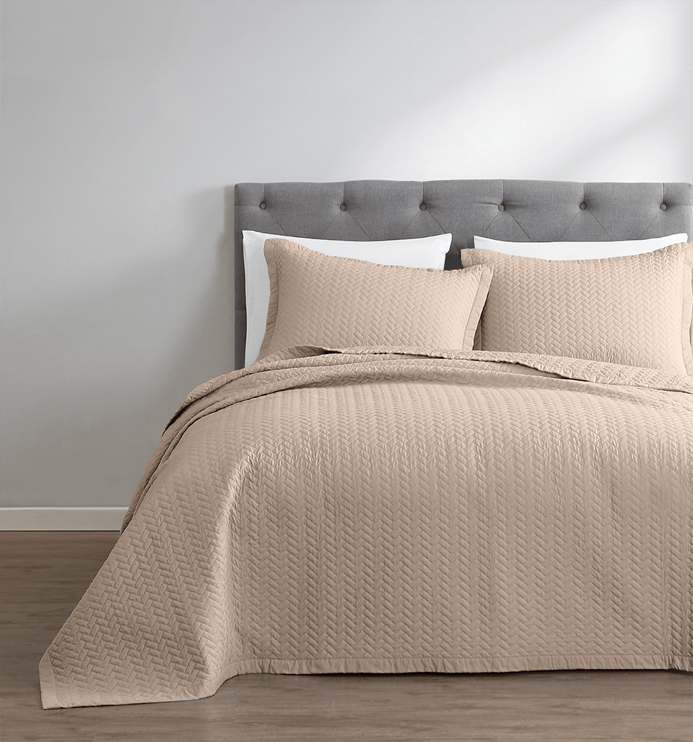 PeachSkinSheets Toasted Marshmallow Oversized Quilt Set on a bed
