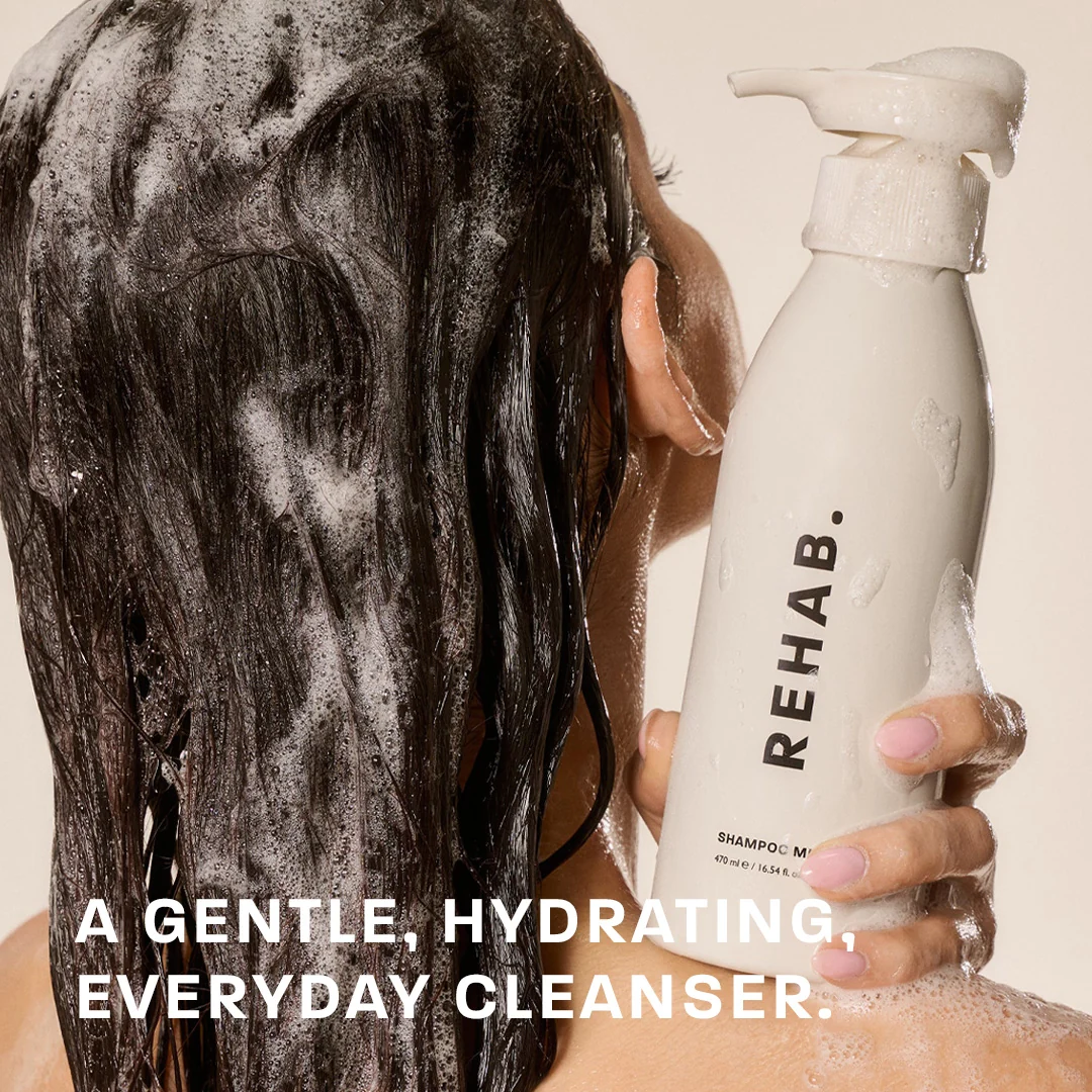 Shampoo Milk bottle pictured in wet hair