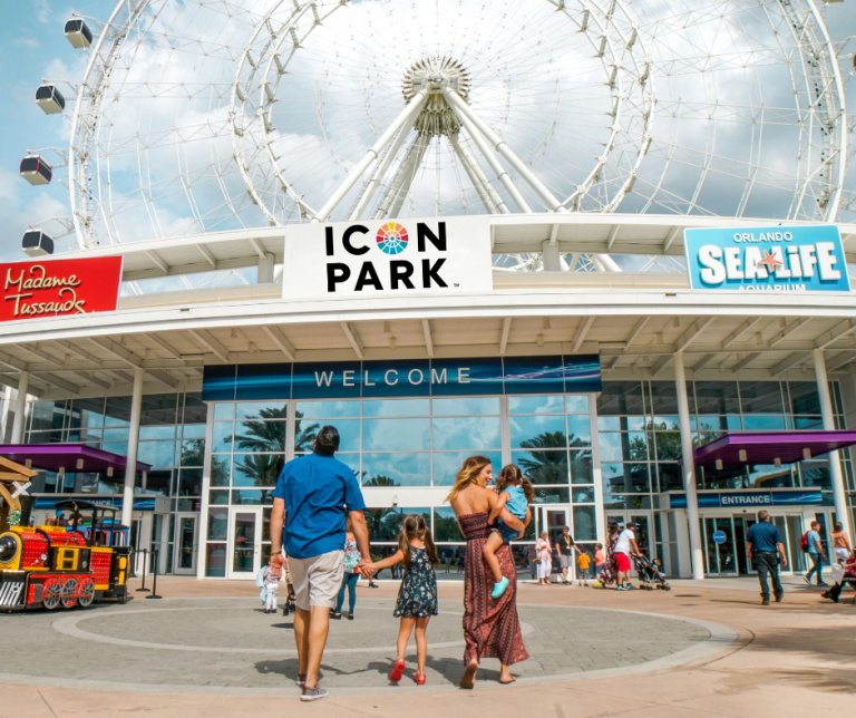 Visitors entering the ICON Park entertainment complex